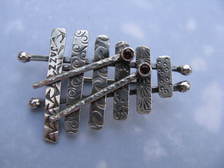 Xylophone with Faceted Garnet